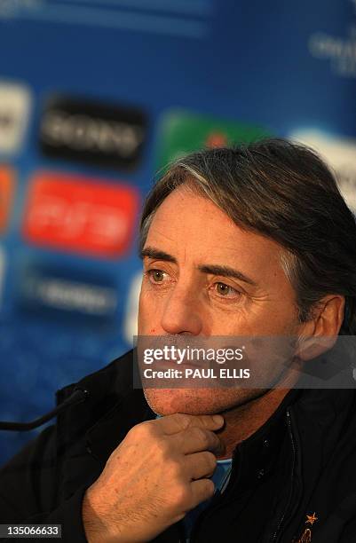 Manchester City's Italian manager Roberto Mancini attends a press conference in Manchester on December 6, 2011 on the eve of their UEFA Champions...