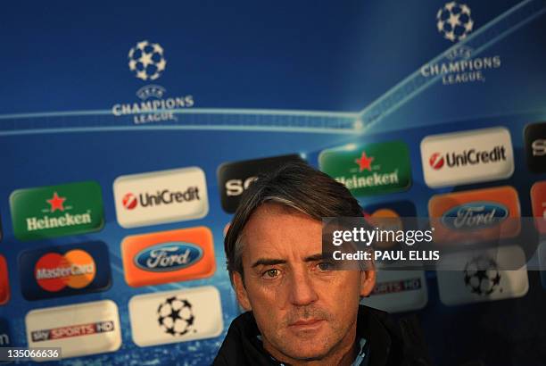 Manchester City's Italian manager Roberto Mancini attends a press conference in Manchester on December 6, 2011 on the eve of their UEFA Champions...