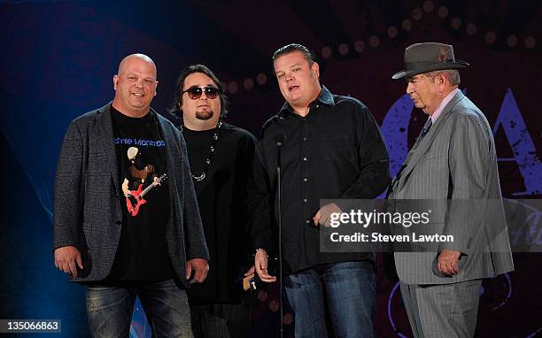 Television personalities Rick Harrison, Austin 'Chumlee' Russell, Corey Harrison and Richard Harrison of 'Pawn Stars' speak onstage at the American...