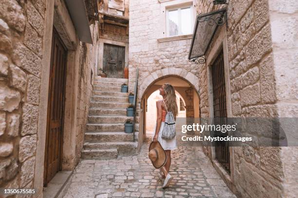 young woman visiting european town in summer - croatia tourist stock pictures, royalty-free photos & images