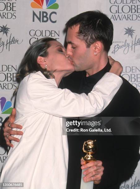 Sibling actors Angelina Jolie and James Haven kiss as they attend the 57th annual Golden Globe Awards at the Beverly Hilton Hotel, Beverly Hills,...