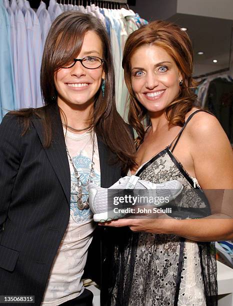 Evangeline Lilly and Michelle K during Evangeline Lilly as The New Face of Michelle K at Kitson in Los Angeles, California, United States.