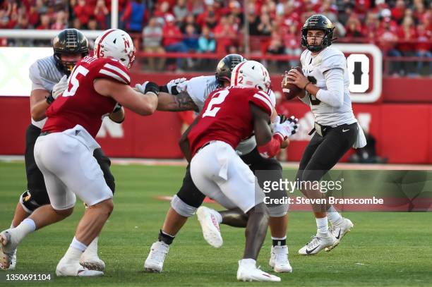 Quarterback Aidan O'Connell of the Purdue Boilermakers looks to pass against the Nebraska Cornhuskers in the second half at Memorial Stadium on...