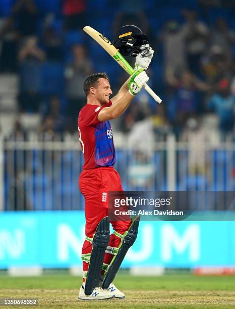 Jos Buttler of England celebrates reaching his century during the ICC Men's T20 World Cup match between England and Sri Lanka at Sharjah Cricket...