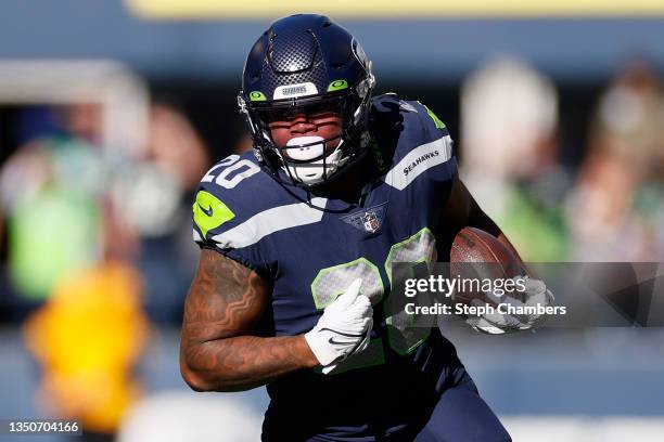 Rashaad Penny of the Seattle Seahawks carries the ball against the Jacksonville Jaguars during the first quarter at Lumen Field on October 31, 2021...