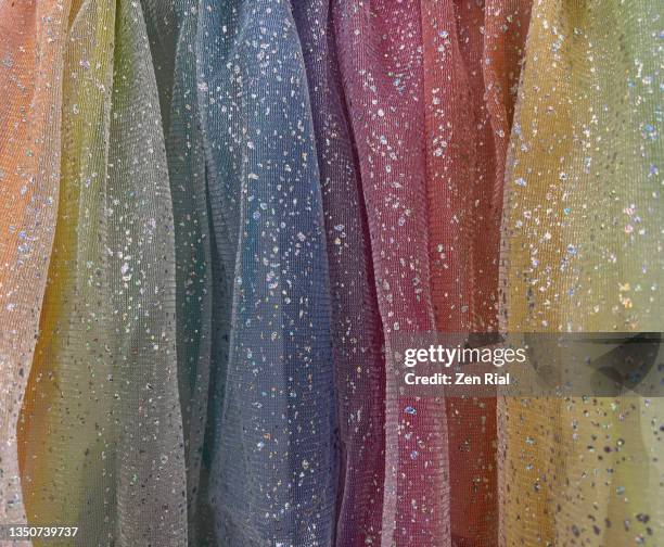 multi colored tulle fabric with silver glitter part of a dress - gerafft stock-fotos und bilder