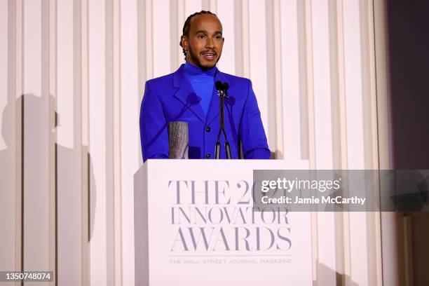 Lewis Hamilton accepts an award onstage during the WSJ. Magazine 2021 Innovator Awards sponsored by Samsung, Harry Winston, and Rémy Martin at MOMA...