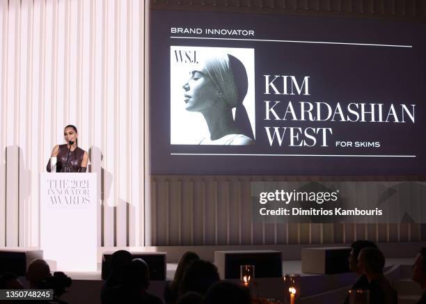 Kim Kardashian West accepts an award onstage during the WSJ. Magazine 2021 Innovator Awards sponsored by Samsung, Harry Winston, and Rémy Martin at...