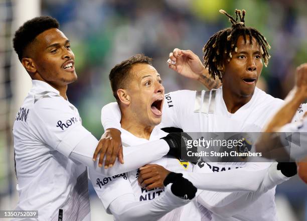 Javier Hernandez of Los Angeles FC celebrates his goal with Rayan Raveloson and Kevin Cabral during the first half against the Seattle Sounders at...