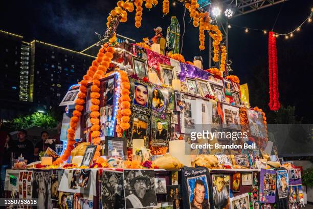 An altar commemorating the Day of the Dead is shown at the Discovery Green park on November 01, 2021 in downtown Houston, Texas. Largely originating...