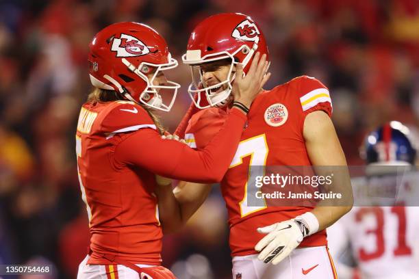 Harrison Butker reacts with Tommy Townsend of the Kansas City Chiefs after kicking the game-winning field goal during the second half against the New...