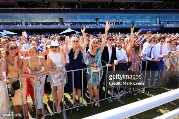 The crowd react as they watch the Melbourne Cup on the big screen during Sydney Racing at Royal Randwick Racecourse on November 02, 2021 in Sydney,...
