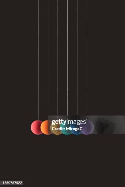rainbow colored spheres hanging on strings in a row - solid line stock pictures, royalty-free photos & images