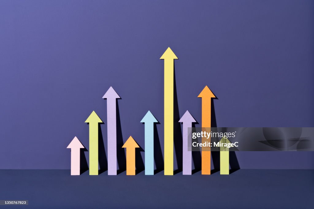 Rising Bar Chart Composed Of Rising Arrows High-Res Stock Photo - Getty ...