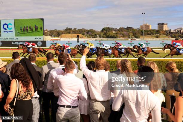 The crowd watch the finish of race 8 during Sydney Racing at Royal Randwick Racecourse on November 02, 2021 in Sydney, Australia.