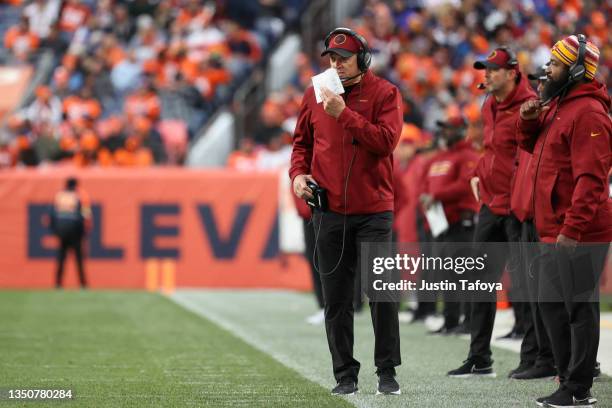 Assistant coach Jack Del Rio of the Washington Football Team coaches from the sideline in the second half of the game against the Denver Broncos at...