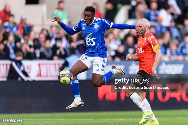 Jean-Ricner Bellegarde of RC Strasbourg plays against Fabien Lemoine of FC Lorient during the Ligue 1 Uber Eats match between RC Strasbourg and FC...