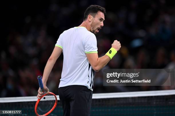 Gianluca Mager of Italy celebrates winning the first set during his singles match against Felix Auger-Aliassime of Canada during day two of the Rolex...