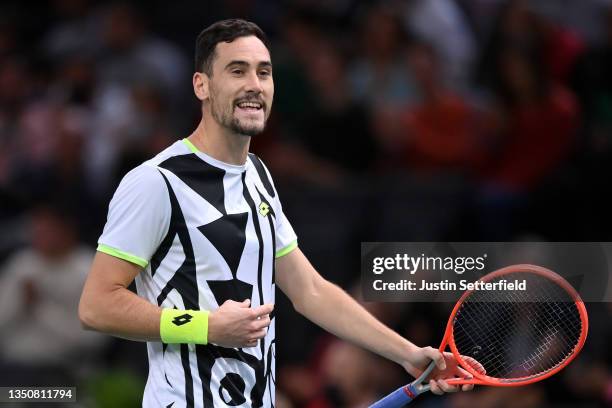 Gianluca Mager of Italy reacts during his singles match against Felix Auger-Aliassime of Canada during day two of the Rolex Paris Masters at...