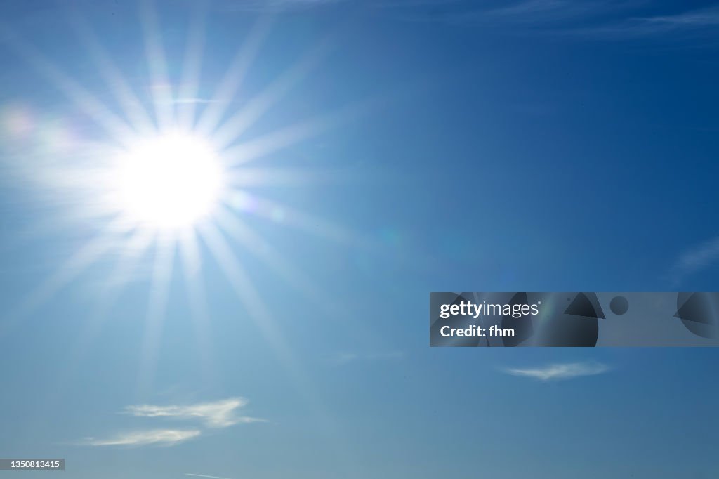 Full bright sun in the blue sky