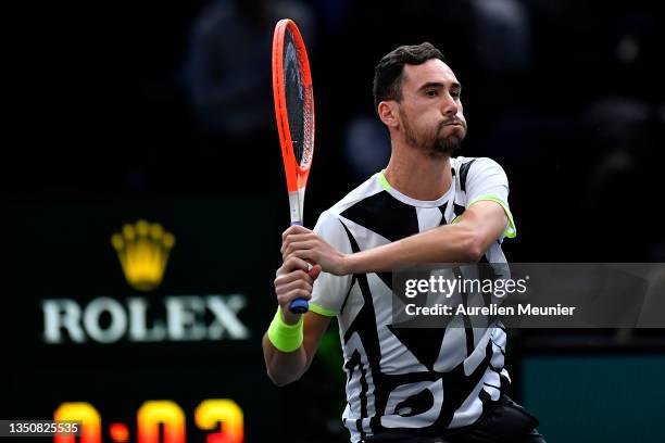 Gianluca Mager of Italy plays a backhand during his singles match against Felix Auger-Aliassime of Canada during day two of the Rolex Paris Masters...