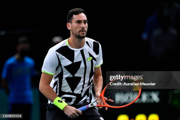 Gianluca Mager of Italy looks on during his singles match against Felix Auger-Aliassime of Canada during day two of the Rolex Paris Masters at...