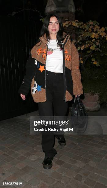 Dua Lipa seen on a night out at Chiltern Firehouse on October 22, 2021 in London, England.