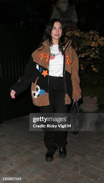 Dua Lipa seen on a night out at Chiltern Firehouse on October 22, 2021 in London, England.