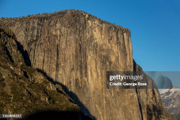 The iconic valley is viewed from Tunnel View just before sunset on October 27 in Yosemite National Park, California. As the seasons transition from...