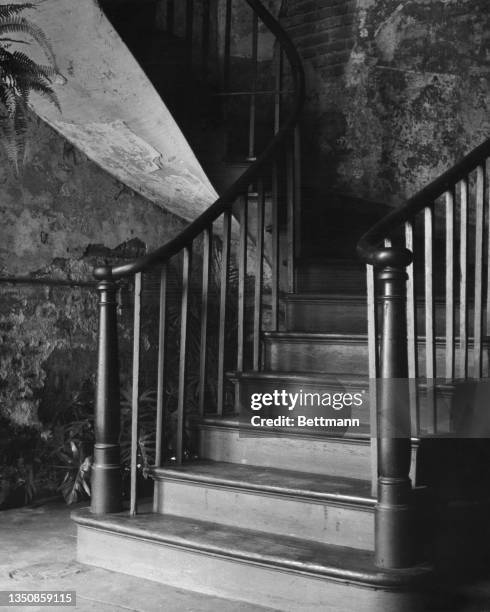 Stairs of the Absinthe House on Bourbon Street, French Quarter, New Orleans, circa 1935.