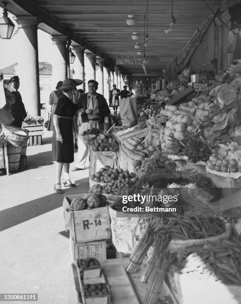 Vegetable food stall at the French Market, New Orleans, US, circa 1935.