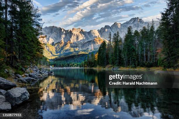 eibsee lake with zugspitze mountain, grainau, bavaria, germany - zugspitze stock pictures, royalty-free photos & images