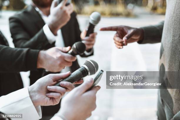 interview time for african male outside - black politician stock pictures, royalty-free photos & images