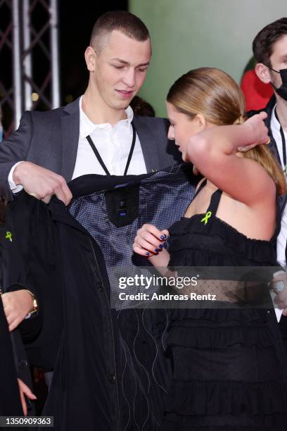 Emma Schweiger and guest attend the "Die Rettung der uns bekannten Welt" premiere at Lichtburg on November 02, 2021 in Essen, Germany.