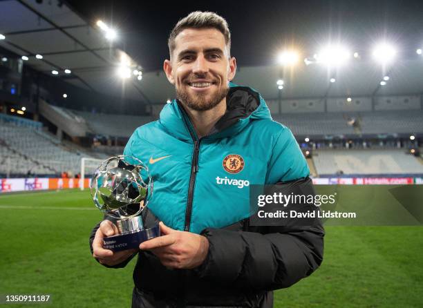 Jorginho of Chelsea poses for a photograph with the Man of the Match award following the UEFA Champions League group H match between Malmo FF and...