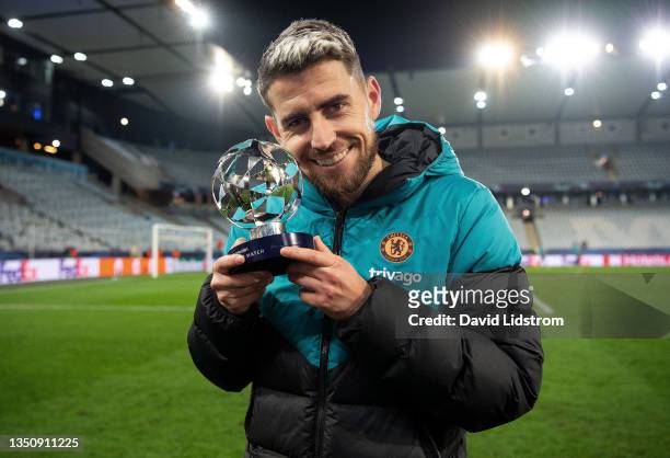 Jorginho of Chelsea poses for a photograph with the Man of the Match award following the UEFA Champions League group H match between Malmo FF and...