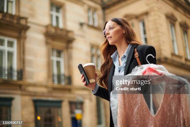 busy officeworker lunchhour - dry cleaned stock pictures, royalty-free photos & images