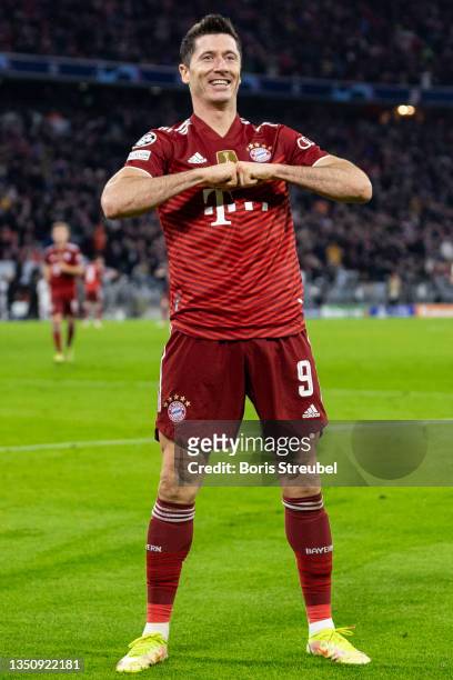 Robert Lewandowski of FC Bayern Muenchen celebrates after scoring his team's fourth goal during the UEFA Champions League group E match between FC...