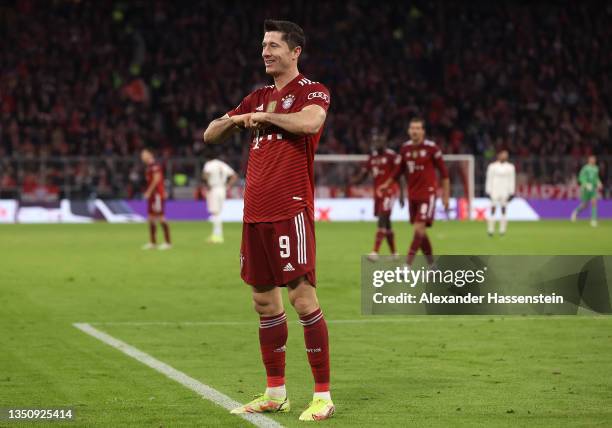 Robert Lewandowski of FC Bayern Muenchen celebrates after scoring their team's fifth goal during the UEFA Champions League group E match between FC...