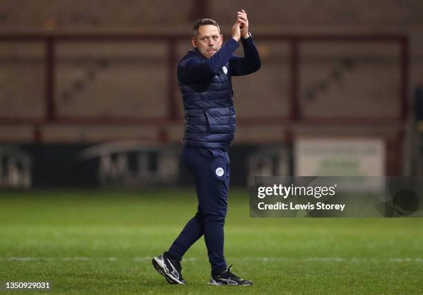 Leam Richardson, Manager of Wigan Athletic acknowledges the fans following victory in the Sky Bet League One match between Fleetwood Town and Wigan...