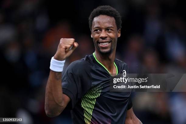 Gael Monfils of France celebrates winning match point during his singles match against Miomir Kecmanovic of Serbia during day two of the Rolex Paris...