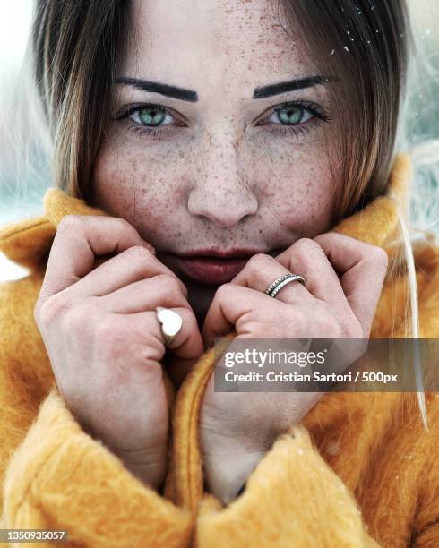 close-up portrait of young woman - beautiful woman winter stock pictures, royalty-free photos & images