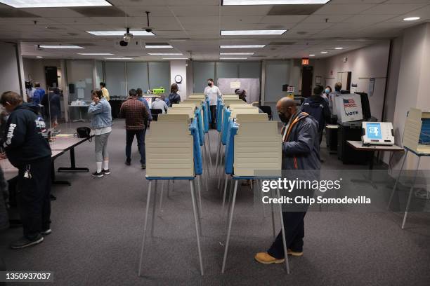 Voters cast ballots at the Fairfax County Government Center on November 02, 2021 in Fairfax, Virginia. Virginians are voting in a gubernatorial race...