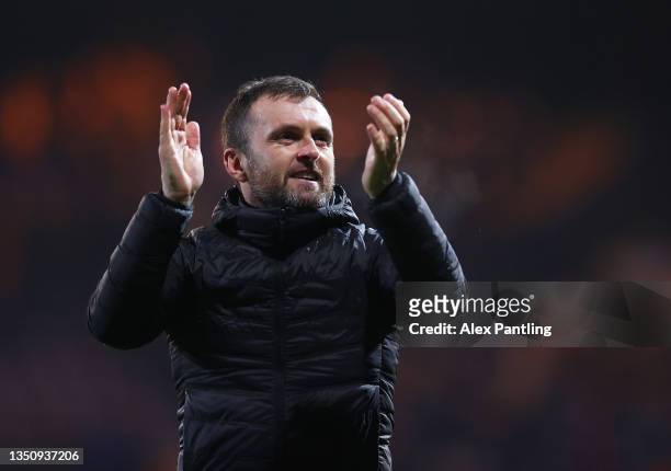 Nathan Jones, Manager of Luton Town acknowledges the fans following the Sky Bet Championship match between Luton Town and Middlesbrough at Kenilworth...