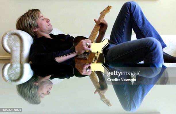 Australian country and western singer, Keith Urban, in Brisbane to participate in the Goodwill Games opening ceremony.