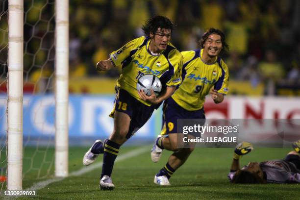 Seiichiro Maki of JEF United Chiba celebrates scoring his side's second goal with his team mate Takenori Hayashi during the J.League J1 match between...