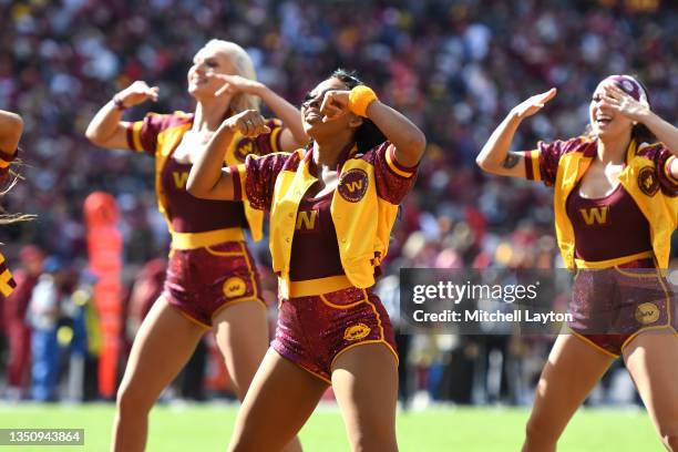 The Washington Football Team cheerleaders perform during a NFL football game against the Kansas City Chiefs at FedExField on October 17, 2021 in...