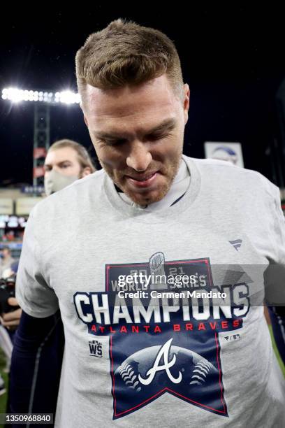 Freddie Freeman of the Atlanta Braves celebrates with teammates after their 7-0 victory against the Houston Astros in Game Six to win the 2021 World...