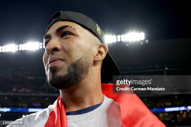 Eddie Rosario of the Atlanta Braves celebrates with teammates after their 7-0 victory against the Houston Astros in Game Six to win the 2021 World...