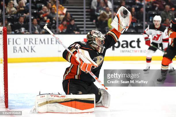 John Gibson of the Anaheim Ducks makes a glove save during the second period of a game against the New Jersey Devils at Honda Center on November 02,...